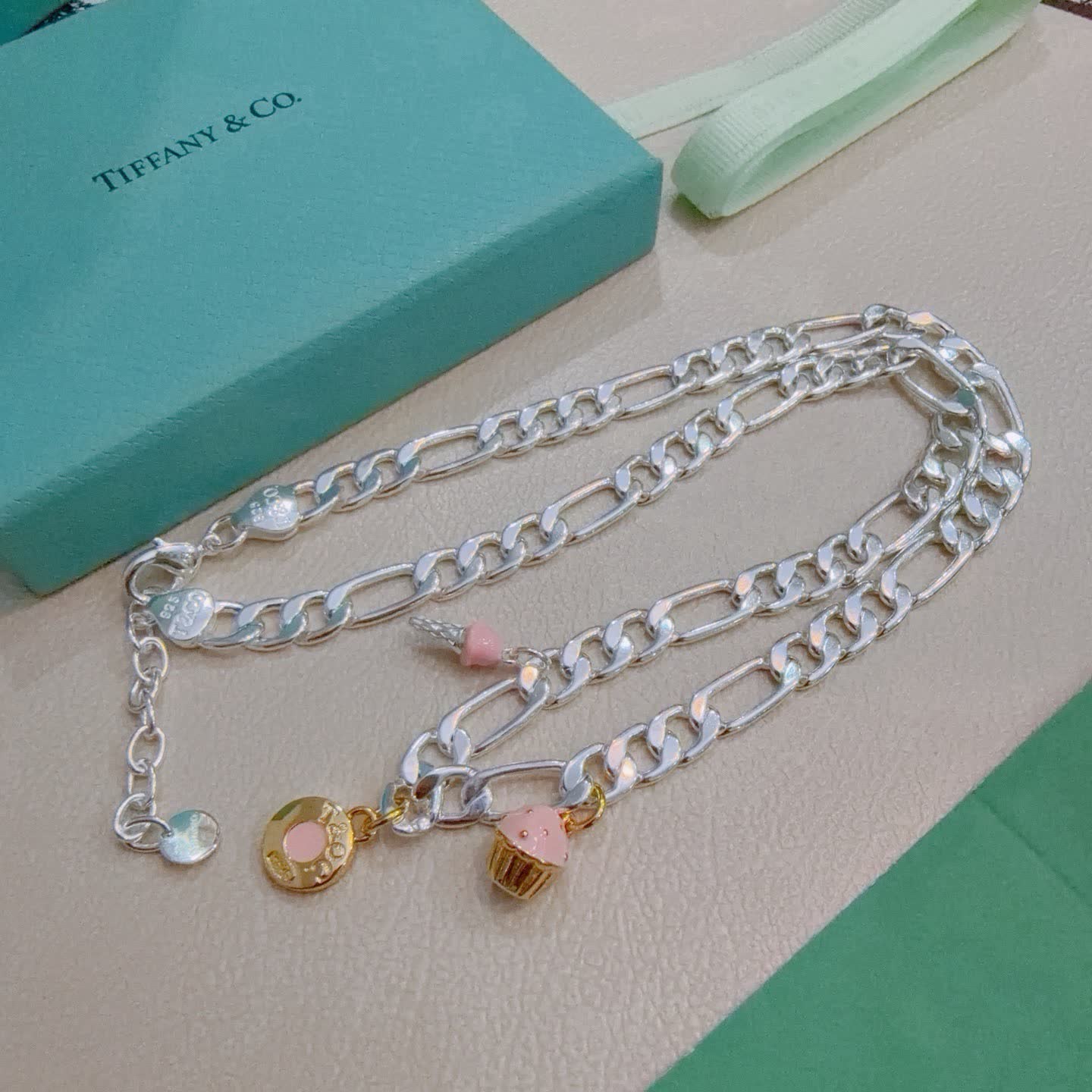 Tiffany & Co. Figaro Chain Necklace with Charm Tiffany & Co. Figaro Chain Necklace with Charm